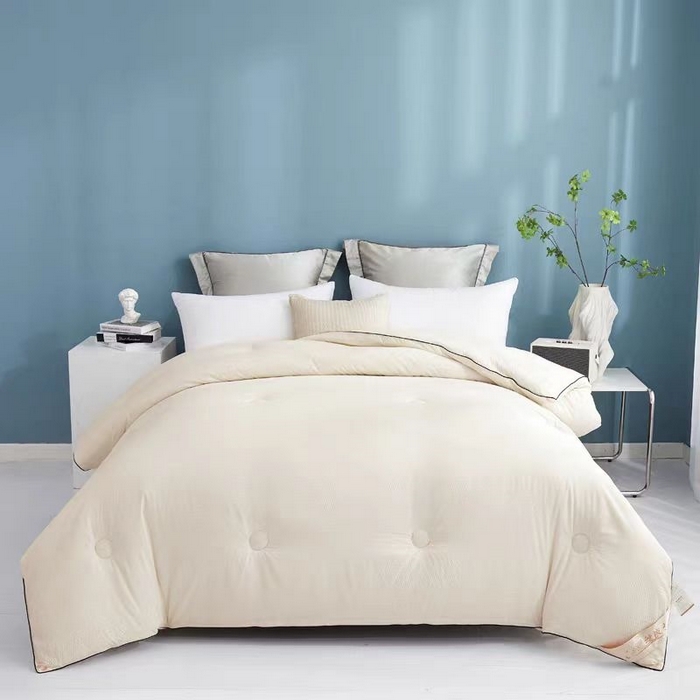 91家纺网 家纺一手货源 找家纺 暖阁 2025新款亲肤压泡豆豆羽丝被冬被春秋被被子被芯 奶白色