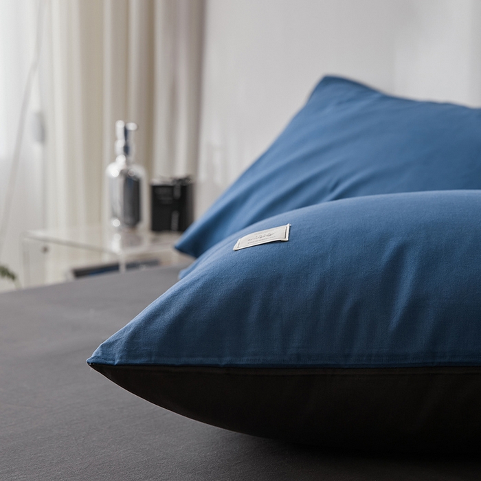 91家纺网 家纺一手货源 找家纺 雅居纺家纺 2025新款全棉素色水洗棉单枕套 牛仔蓝低调灰