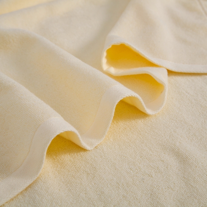 91家纺网 家纺一手货源 找家纺 悦然毛巾被 2025新款全棉幻彩灵动浴巾 灵动黄