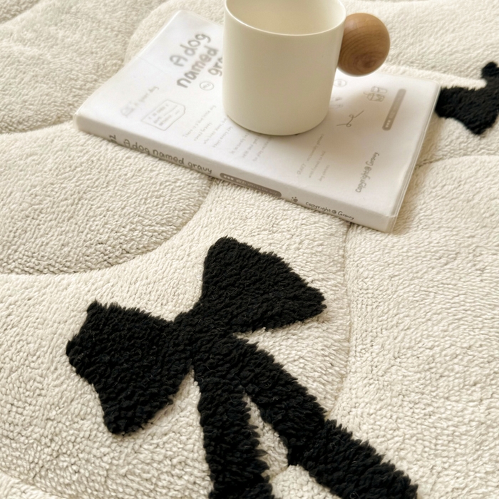 91家纺网 家纺一手货源 找家纺 梦初语 2025新款A类高克重立体毛巾绣阳粒子床垫褥 蝴蝶结-米