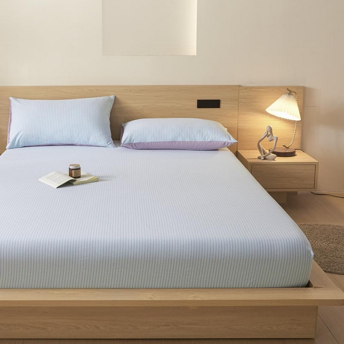 91家纺网 家纺一手货源 找家纺 ab家纺 2025新款简约色织水洗棉床笠 余晖-蓝紫