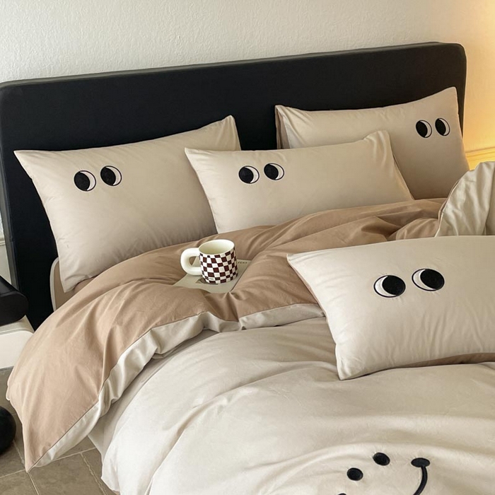 91家纺网 家纺一手货源 找家纺 ab家纺 2025新款纯色水洗棉笑脸双拼绣花四件套 笑脸 卡其米咖