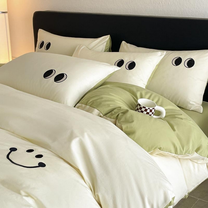 91家纺网 家纺一手货源 找家纺 ab家纺 2025新款纯色水洗棉笑脸双拼绣花四件套 笑脸  杏黄橄榄绿