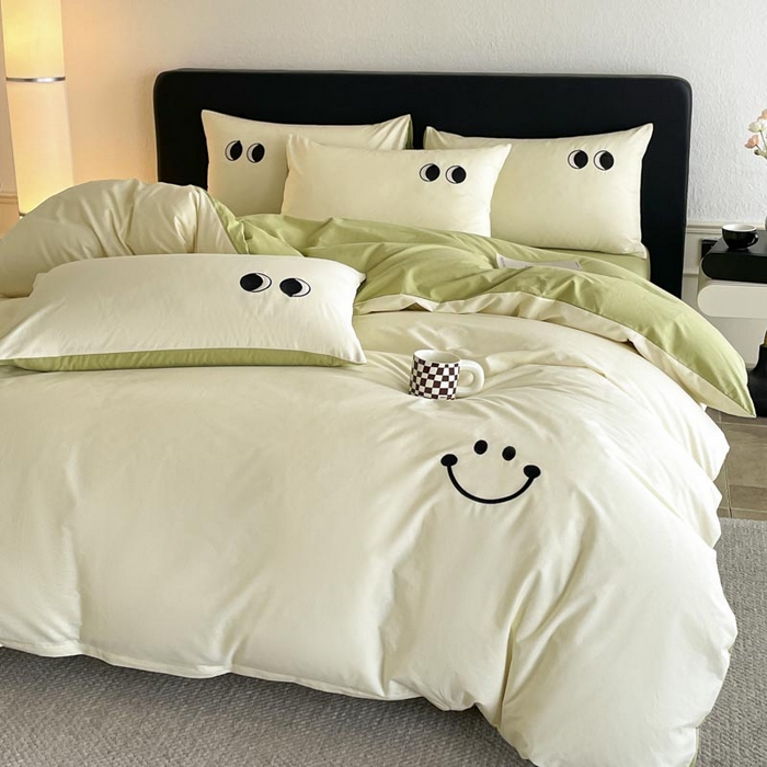 91家纺网 家纺一手货源 找家纺 ab家纺 2025新款纯色水洗棉笑脸双拼绣花四件套 笑脸  杏黄橄榄绿