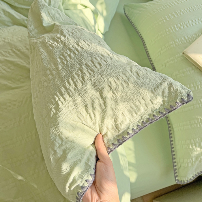 91家纺网 家纺一手货源 找家纺 娜娜 2025新款磨毛水洗棉泡泡纱贝壳边四件套 泡泡纱-果绿