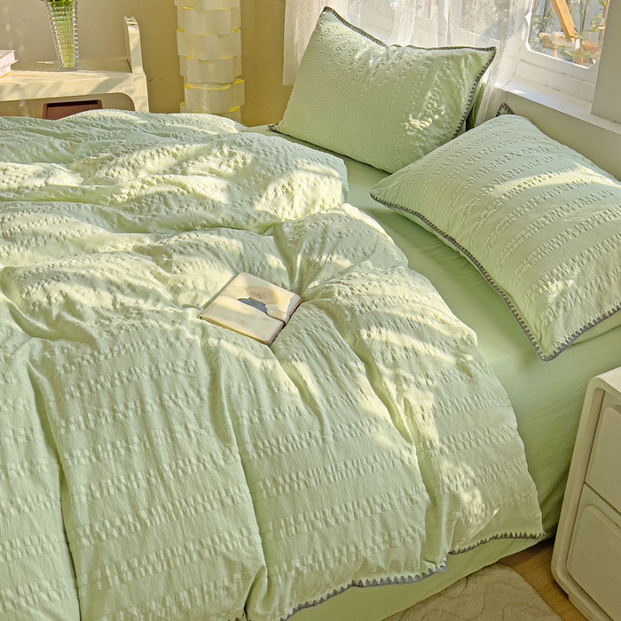 91家纺网 家纺一手货源 找家纺 娜娜 2025新款磨毛水洗棉泡泡纱贝壳边四件套 泡泡纱-果绿