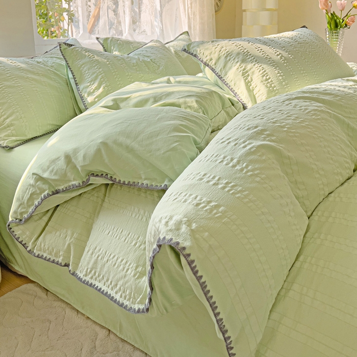 91家纺网 家纺一手货源 找家纺 娜娜 2025新款磨毛水洗棉泡泡纱贝壳边四件套 泡泡纱-果绿