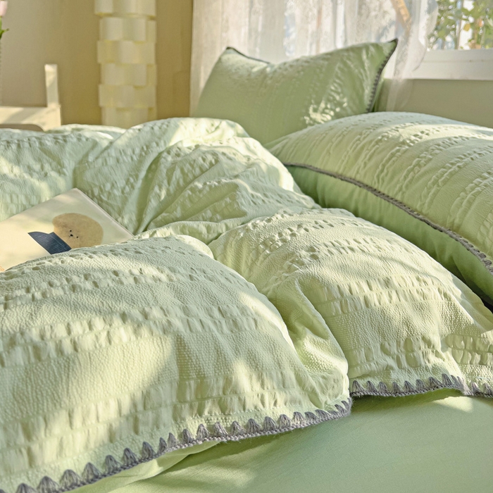 91家纺网 家纺一手货源 找家纺 娜娜 2025新款磨毛水洗棉泡泡纱贝壳边四件套 泡泡纱-果绿