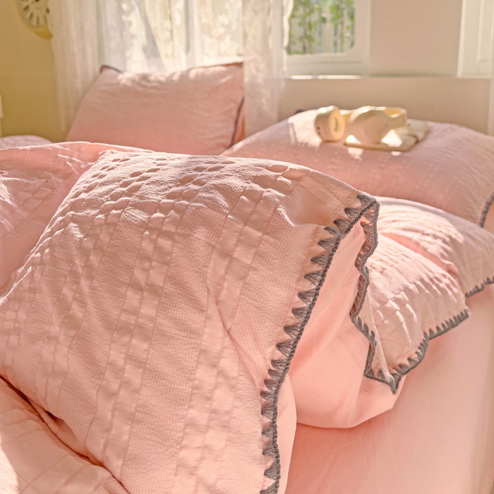 91家纺网 家纺一手货源 找家纺 娜娜 2025新款磨毛水洗棉泡泡纱贝壳边四件套 泡泡纱-藕粉