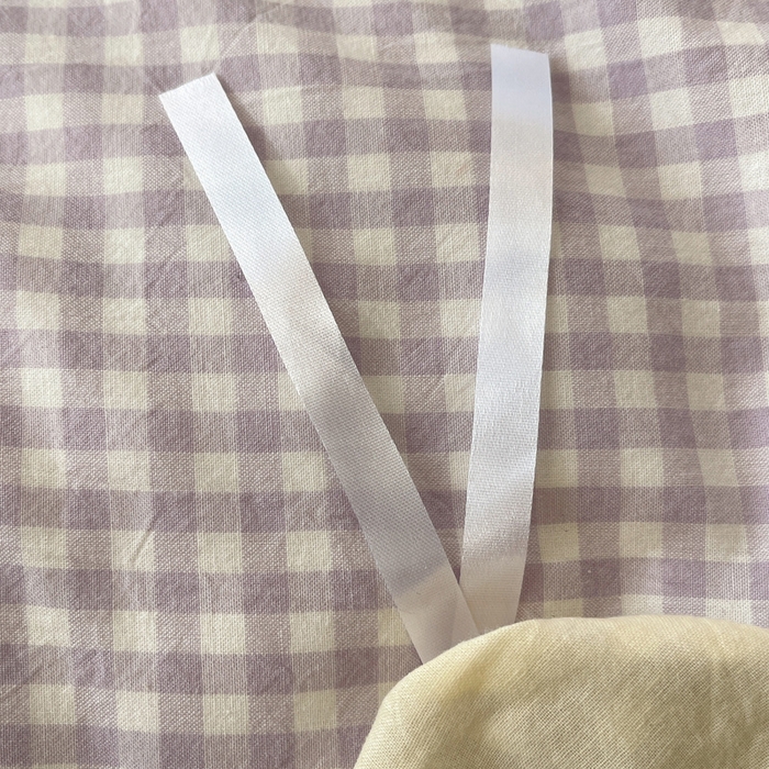 91家纺网 家纺一手货源 找家纺 2025新款A类亲肤舒适软糯云柔水洗棉大眼睛毛巾绣混搭格子撞色系列四件套 大眼紫小格奶黄