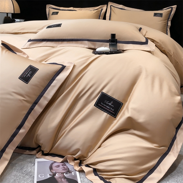 91家纺网 家纺一手货源 找家纺 金喜 2025新款40S纯棉四件套全棉宽边拼角贴布绣四件套 香槟棕