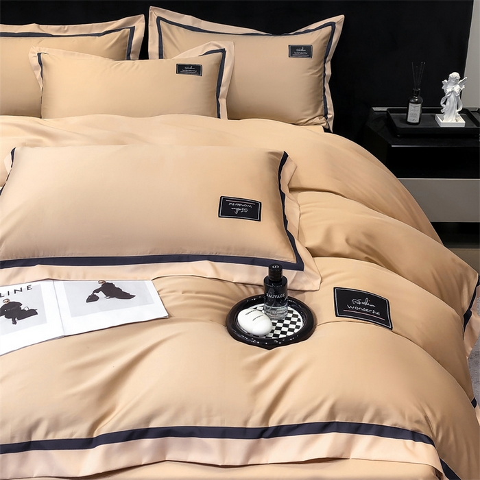 91家纺网 家纺一手货源 找家纺 金喜 2025新款40S纯棉四件套全棉宽边拼角贴布绣四件套 香槟棕