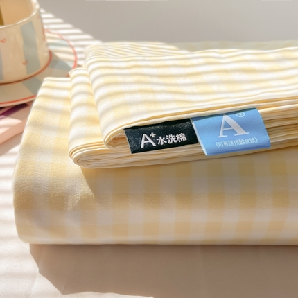 91家纺网 家纺一手货源 找家纺 韩巢家纺 2025新款格子纯色A类水洗棉床单单件 浅黄格