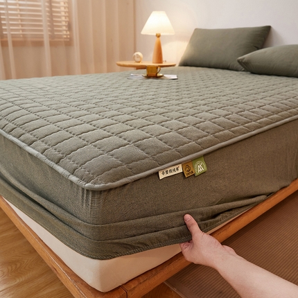 91家纺网 家纺一手货源 找家纺 喜居 2025新款全棉色织大豆夹棉床笠 千鸟绿大豆夹棉床笠