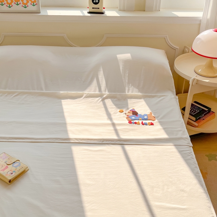 91家纺网 家纺一手货源 找家纺 柒星睡袋 2025新款a类水洗毛巾绣一次性隔脏睡袋 腊肠狗米白