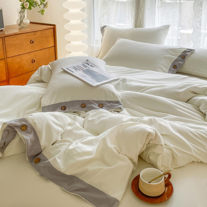 91家纺网 家纺一手货源 找家纺 库里梦家纺 2025新款贴边纽扣式纯色水洗棉四件套 贴边纽扣-奶油白