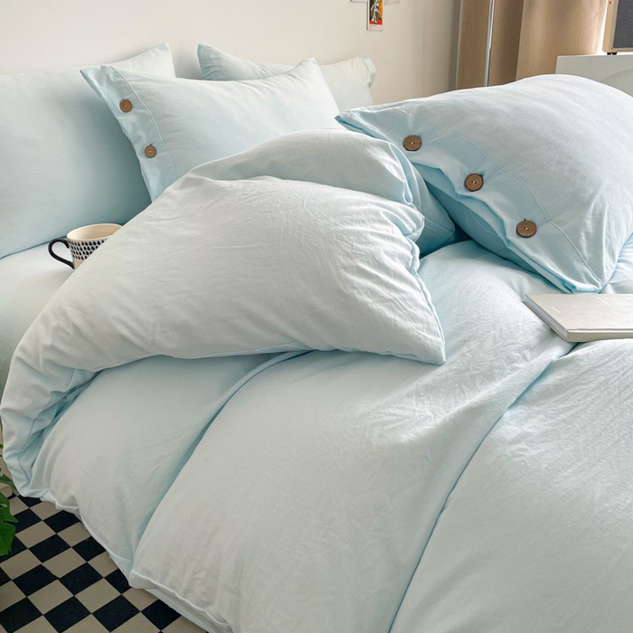 91家纺网 家纺一手货源 找家纺 库里梦家纺 2025新款水洗棉纽扣四件套学生季A类简约纯色无印风四件套 纽扣浅蓝