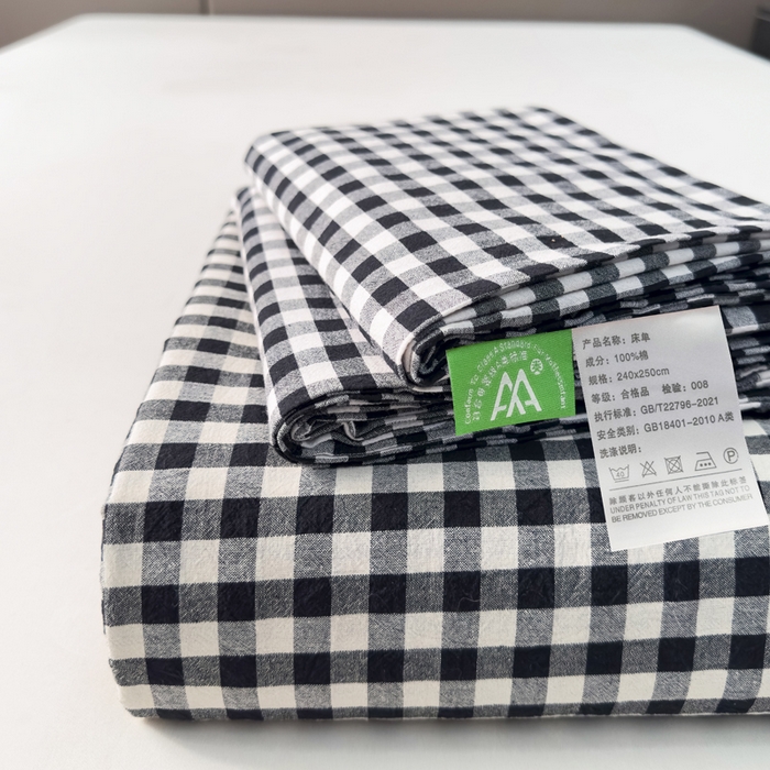 91家纺网 家纺一手货源 找家纺 柠萌家居 2025新款无印风全棉色织A类母婴级纯棉水洗棉床单 黑白小格