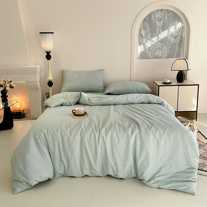 91家纺网 家纺一手货源 找家纺 优迈 2025新款ins风亲肤卡通条格印花水洗棉系列四件套 日系独白绿