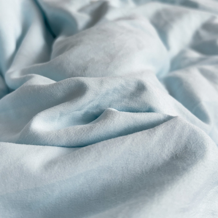 91家纺网 家纺一手货源 找家纺 花伞家居 2025新款纯色拼色柔软亲肤水洗棉简约四件套   奶蓝+奶油粉