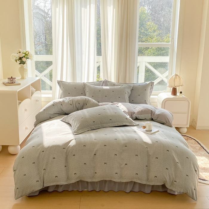 91家纺网 家纺一手货源 找家纺 尚美 2025新款小碎花针织棉床盖四件套 黑色蝴蝶结