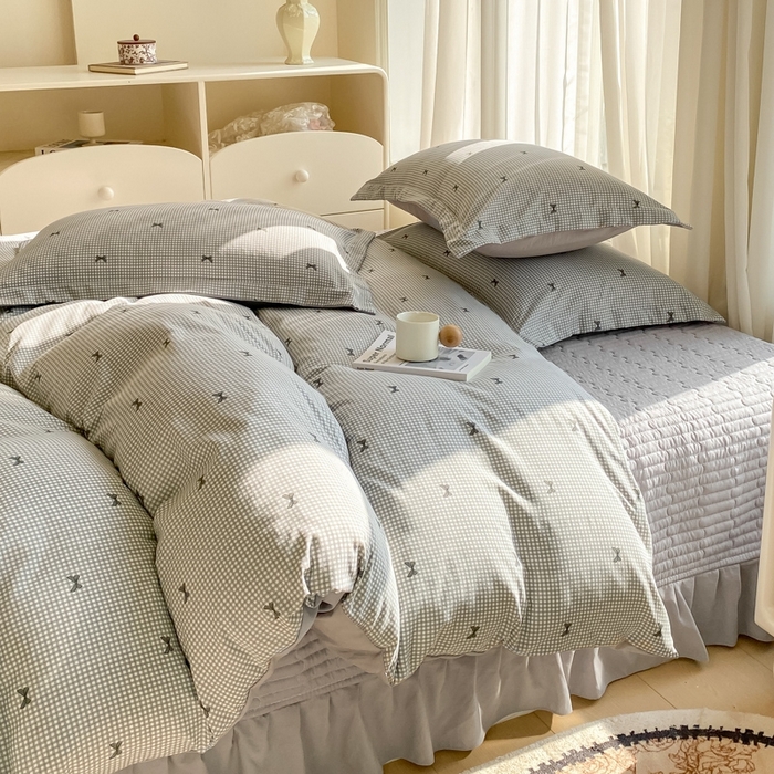 91家纺网 家纺一手货源 找家纺 尚美 2025新款小碎花针织棉床盖四件套 黑色蝴蝶结