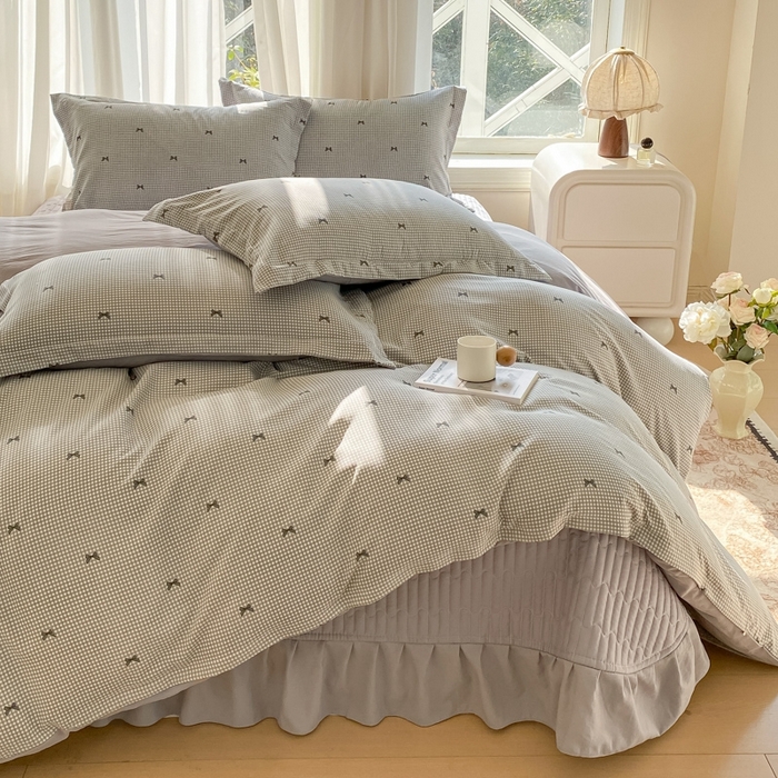 91家纺网 家纺一手货源 找家纺 尚美 2025新款小碎花针织棉床盖四件套 黑色蝴蝶结