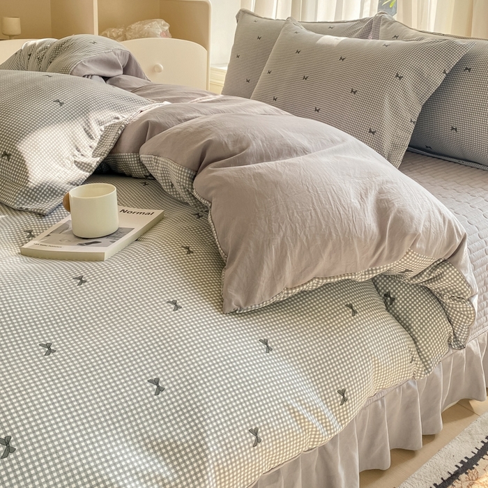 91家纺网 家纺一手货源 找家纺 尚美 2025新款小碎花针织棉床盖四件套 黑色蝴蝶结