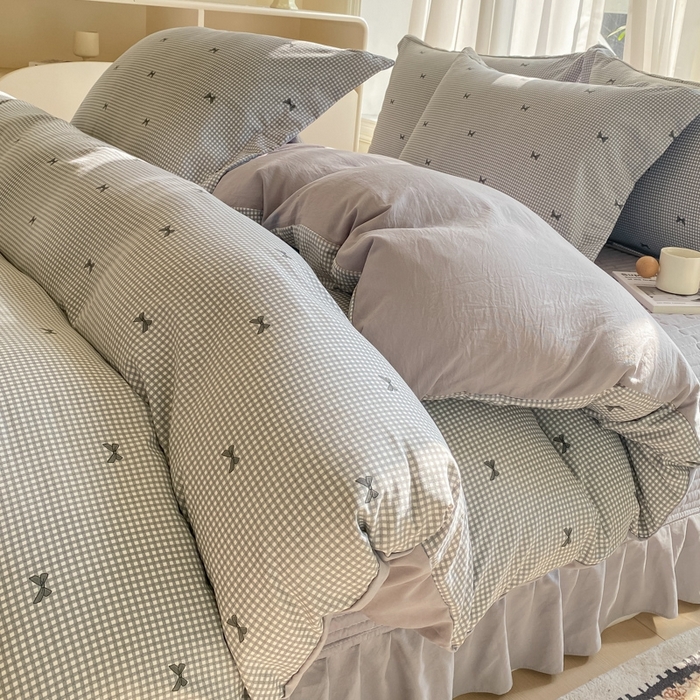 91家纺网 家纺一手货源 找家纺 尚美 2025新款小碎花针织棉床盖四件套 黑色蝴蝶结