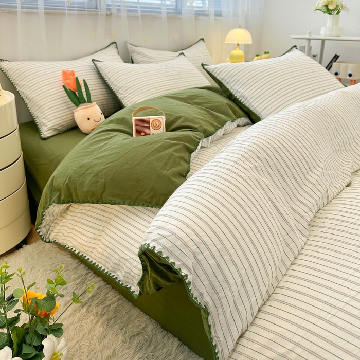 91家纺网 家纺一手货源 找家纺 简宜家居（朝初家纺） 2025新款色织小提花三角针款四件套 三角针绿灰条