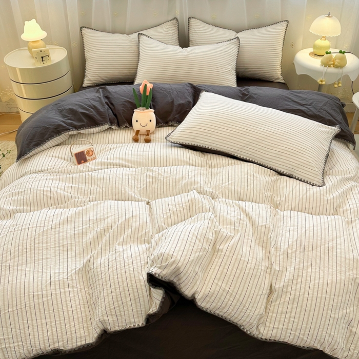 91家纺网 家纺一手货源 找家纺 简宜家居（朝初家纺） 2025新款色织小提花三角针款四件套 三角针黑灰条