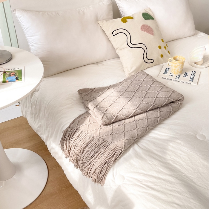 91家纺网 家纺一手货源 找家纺 朴尔家纺-毛巾被 2025新款菱形格条纹流苏手工针织毯 浅咖色