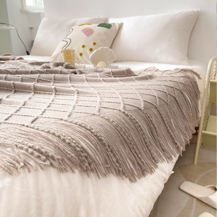 91家纺网 家纺一手货源 找家纺 朴尔家纺-毛巾被 2025新款菱形格条纹流苏手工针织毯 浅咖色