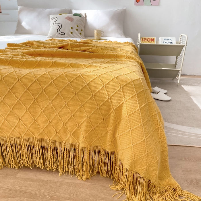 91家纺网 家纺一手货源 找家纺 朴尔家纺-毛巾被 2025新款菱形格条纹流苏手工针织毯 杏黄色