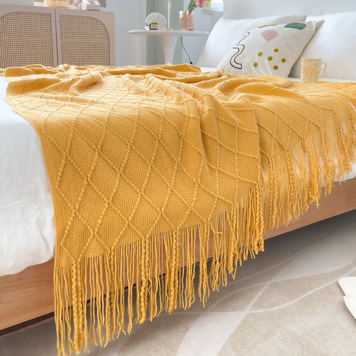 91家纺网 家纺一手货源 找家纺 朴尔家纺-毛巾被 2025新款菱形格条纹流苏手工针织毯 杏黄色