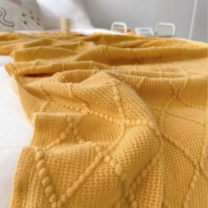 91家纺网 家纺一手货源 找家纺 朴尔家纺-毛巾被 2025新款菱形格条纹流苏手工针织毯 杏黄色