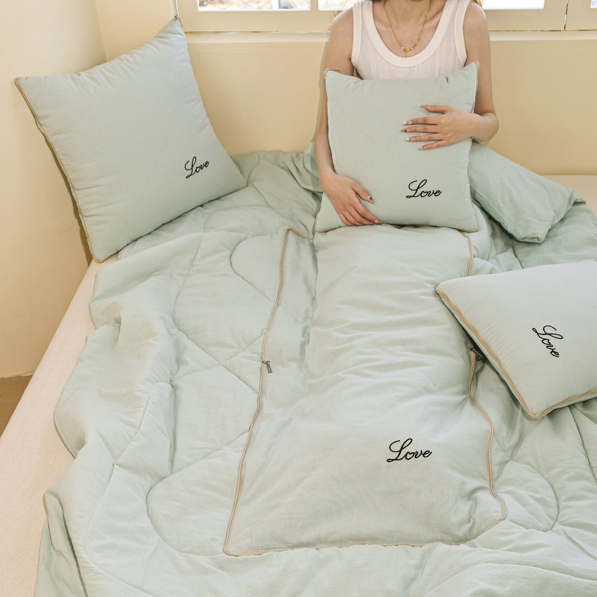 91家纺网 家纺一手货源 找家纺 番茄+ 2025新款全棉麻感纯色抱枕被 浅蓝