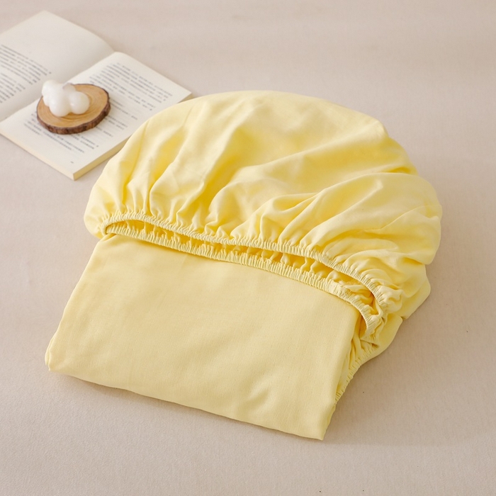 91家纺网 家纺一手货源 找家纺 晶缦家纺 2025新款纯棉纯色全棉双层纱系列单床笠 觅琳-浅蜜黄