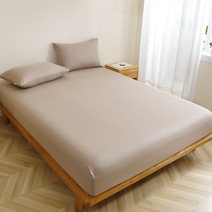 91家纺网 家纺一手货源 找家纺 晶缦家纺 2025新款纯棉纯色全棉双层纱系列单床笠 觅琳-浅卡其