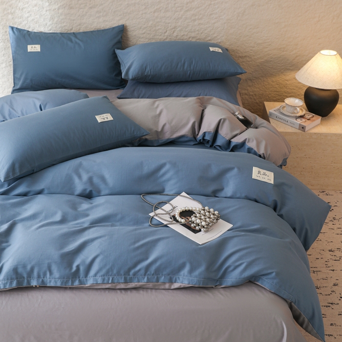91家纺网 家纺一手货源 找家纺 眠博士 2025新款高支高密全棉双拼40支纯色四件套场景二 全棉拼色-宝蓝+银灰