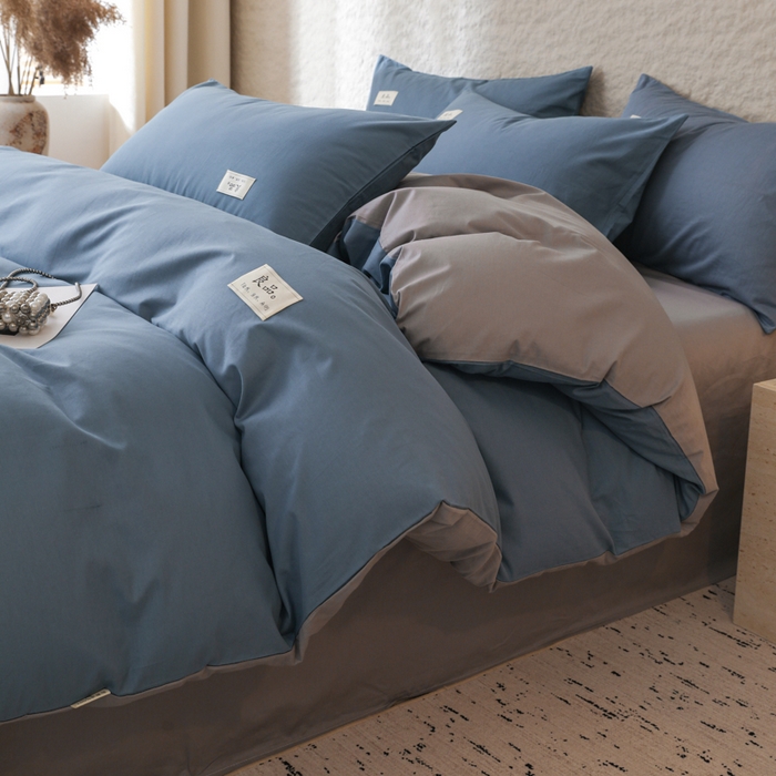 91家纺网 家纺一手货源 找家纺 眠博士 2025新款高支高密全棉双拼40支纯色四件套场景二 全棉拼色-宝蓝+银灰