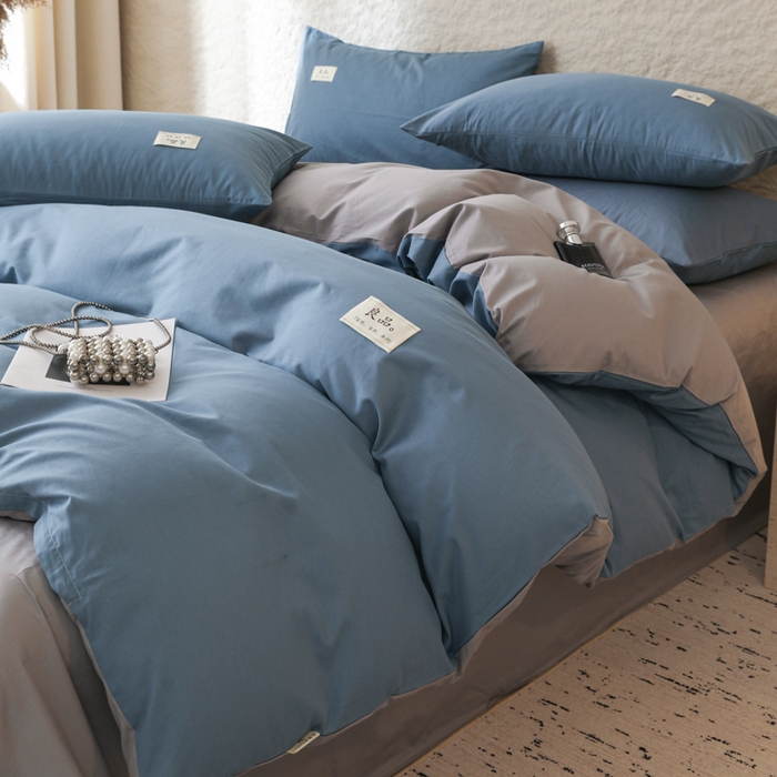 91家纺网 家纺一手货源 找家纺 眠博士 2025新款高支高密全棉双拼40支纯色四件套场景二 全棉拼色-宝蓝+银灰