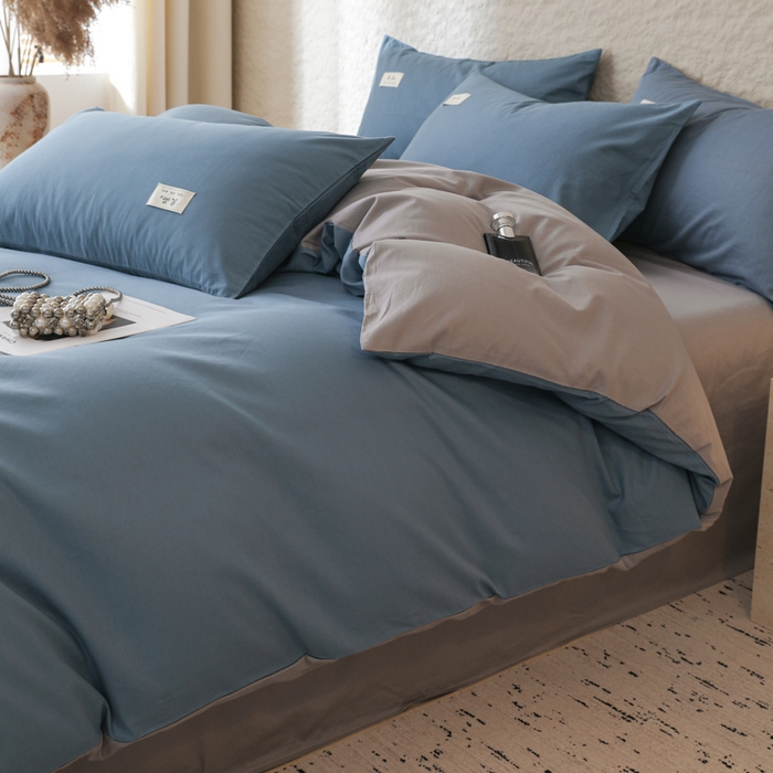 91家纺网 家纺一手货源 找家纺 眠博士 2025新款高支高密全棉双拼40支纯色四件套场景二 全棉拼色-宝蓝+银灰