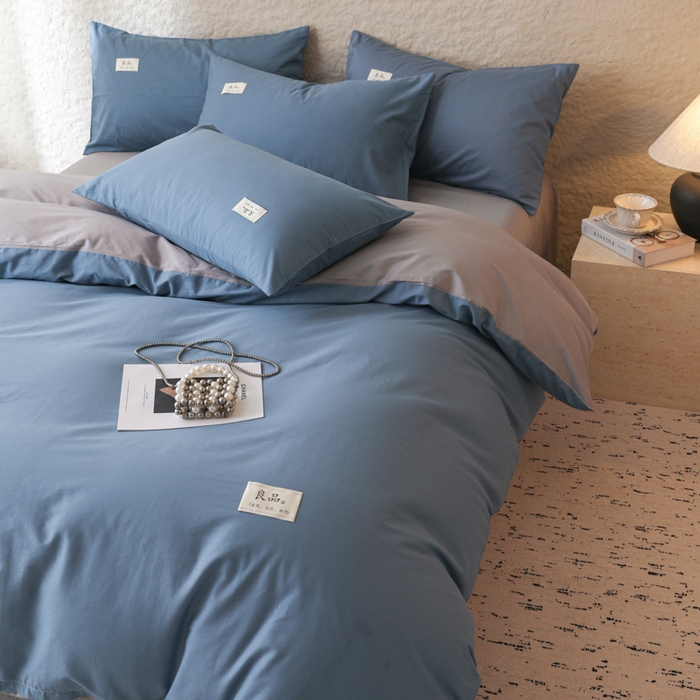 91家纺网 家纺一手货源 找家纺 眠博士 2025新款高支高密全棉双拼40支纯色四件套场景二 全棉拼色-宝蓝+银灰