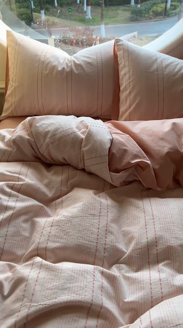 91家纺网 家纺一手货源 找家纺 田野家纺2025新款全棉水洗棉米粒系列四件套 水洗棉米拉 粉