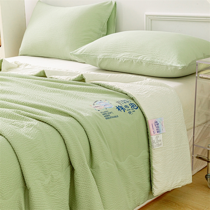 91家纺网 家纺一手货源 找家纺 天瑜家纺 2025新款亲肤舒适泡泡棉夏被 绿+米黄