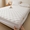91家纺网 家纺一手货源 找家纺 （总）鑫钰2025新款防水纯棉全棉夹棉床笠--四叶草白墙