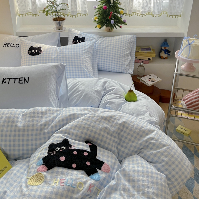 91家纺网 家纺一手货源 找家纺 桃心家居 2025新款A类亲肤舒适软糯云柔水洗棉印加绣卡通毛巾绣水洗棉系列 云柔水洗棉-印加绣蓝格黑小猫