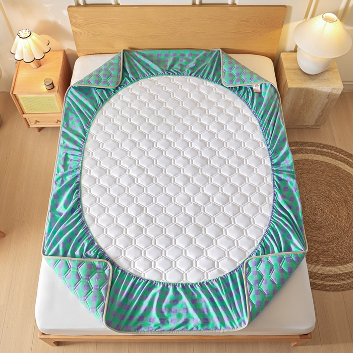 91家纺网 家纺一手货源 找家纺 雪云美2025新款A类全棉色织水洗棉夹棉床笠大豆床罩床垫保护套可定制 绿紫格