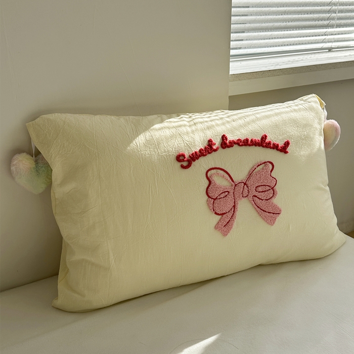 91家纺网 家纺一手货源 找家纺 丽涵 2025新款水洗棉爱心球球单品枕套 蝴蝶结-奶黄